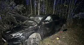 В ХМАО водитель, лишенный прав, перевернулся на трассе смерти